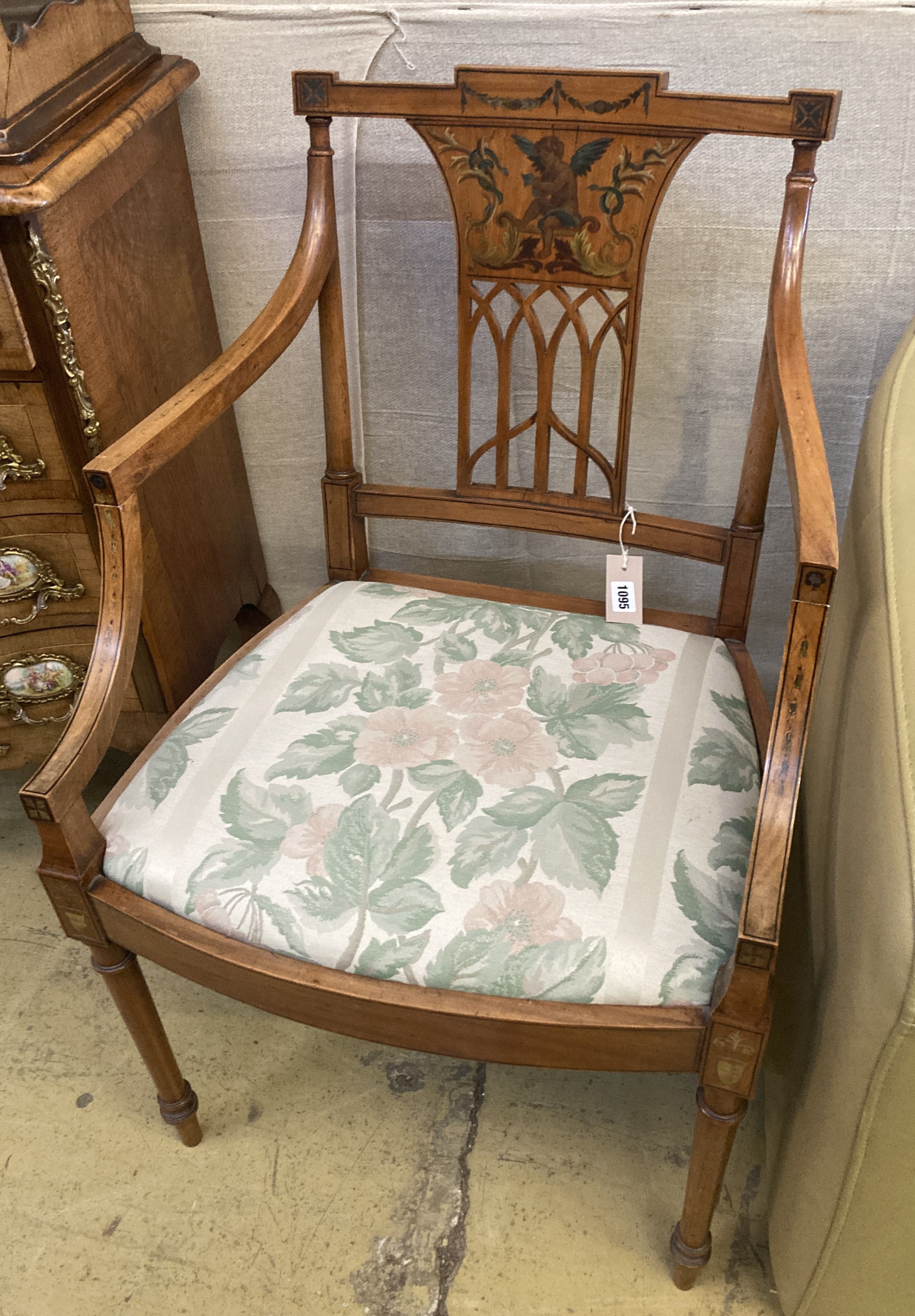 An Edwardian Sheraton revival satinwood open armchair, width 55cm, depth 60cm, height 89cm